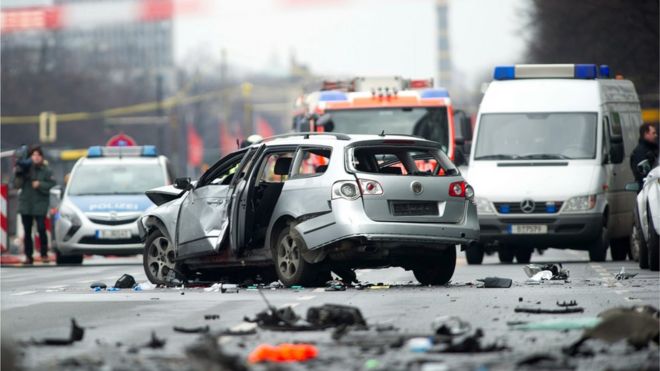 A damaged car on Bismarckstrasse in Berlin, Germany, 15 March 2016. The driver died when an explosion occurred in the vehicle while it was moving.
