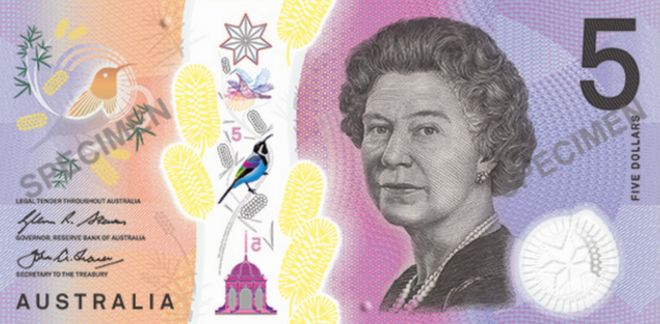 One side of the new five dollar note showing Queen Elizabeth