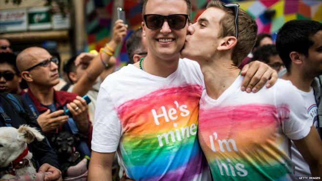 A gay couple attend the Gay Pride Parade in San Francisco, California - 28 June 2015
