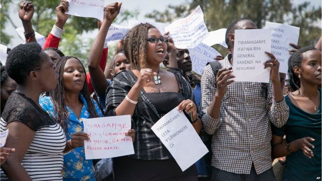 Protesters calling for the release of General Karenzi Karake outside the British High Commission in Kigali, Rwanda on 24 June 2015.