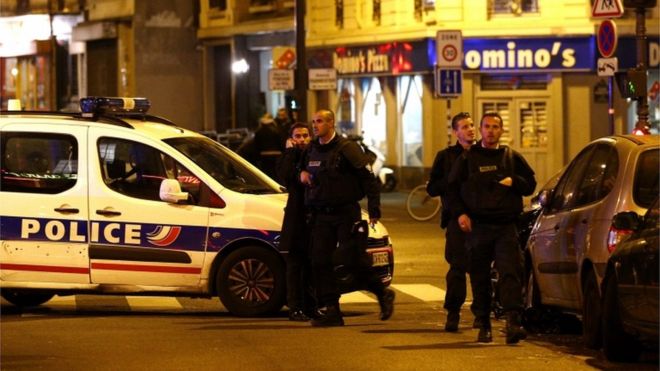 Police officers arrive at the scene of a shooting in Paris France 13 November 2015