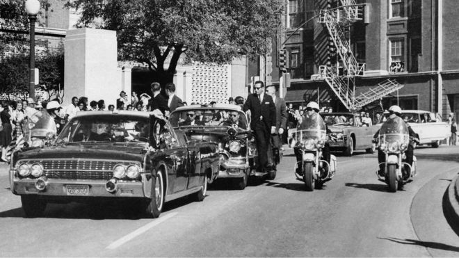 A Nov. 22, 1963 file photo, showing President John F. Kennedy's motorcade in Dallas, Texas