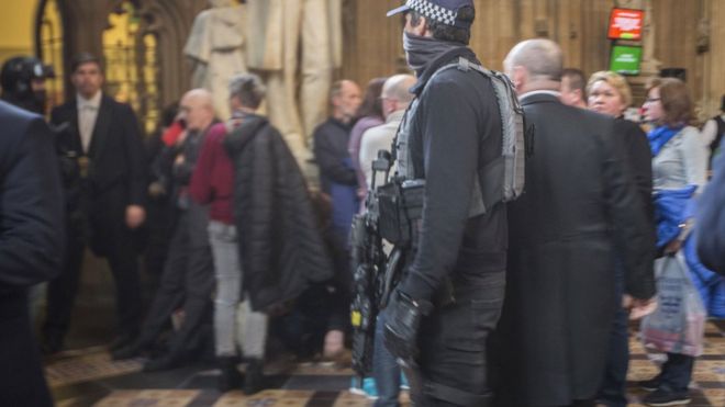 Armed police inside the Palace of Westminster