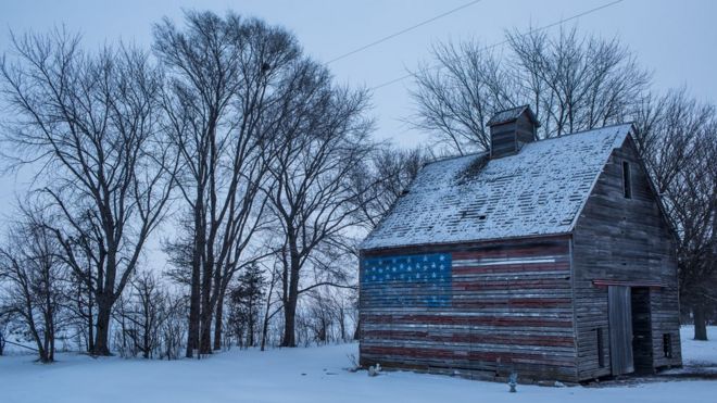 A barn painted with the American flag