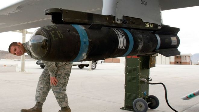 An inert Hellfire missile is loaded on to an MQ-1B Predator drone at Creech Air Force Base, Indian Springs, Nevada. 16 April 2009