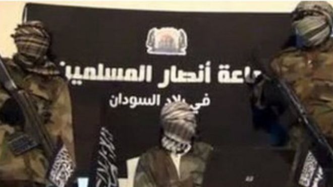 An image from a video released by Jama'tu Ansarul Muslimina Fi Biladis Sudan, the Islamist group known as Ansaru, which reportedly shows unidentified members of the group speaking in an undisclosed place in November 2012