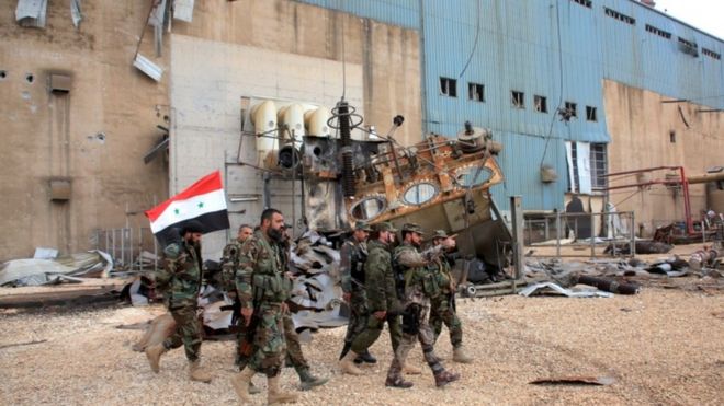 Syrian government forces patrol near Aleppo, 21 Feb