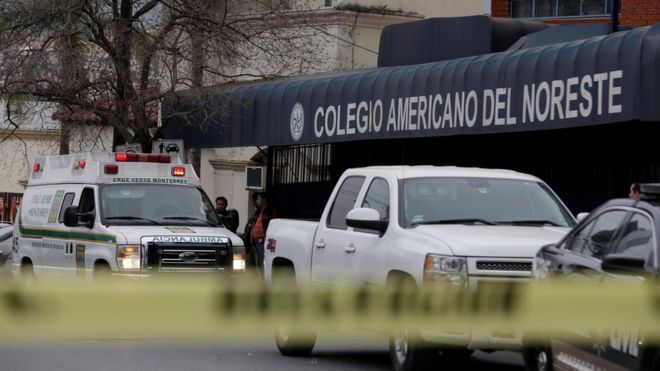 A yellow police line cordons off access to the Colegio Americano del Noreste after a student opened fire at the American school, according to the state"s security spokesman, in Monterrey, Mexico
