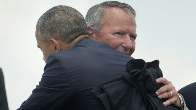 Mayor Buddy Dyer embraces Mr Obama