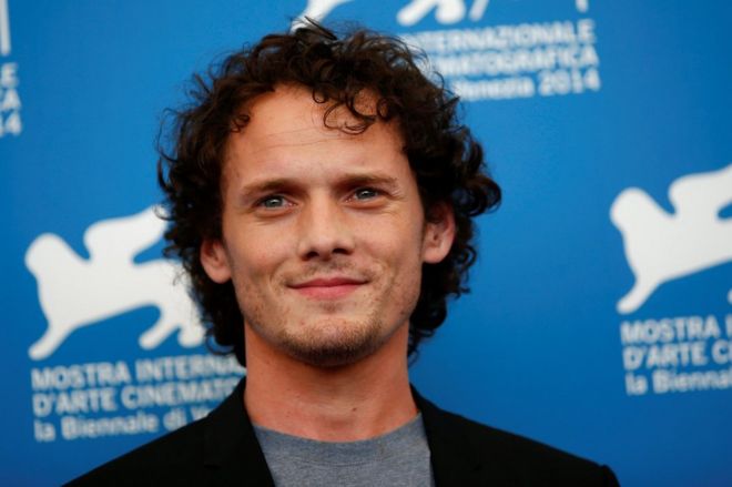 Anton Yelchin poses during the photo call for the film Burying the ex at the 71st Venice Film Festival 4 September, 2014