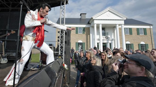 An Elvis lookalike performs at the inauguration of the Elvis museum in Denmark