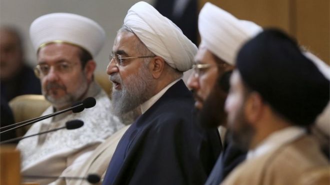 Iranian President Hassan Rouhani, second left, speaks during the 29th International Islamic Unity Conference in Tehran, Iran, on 27 December