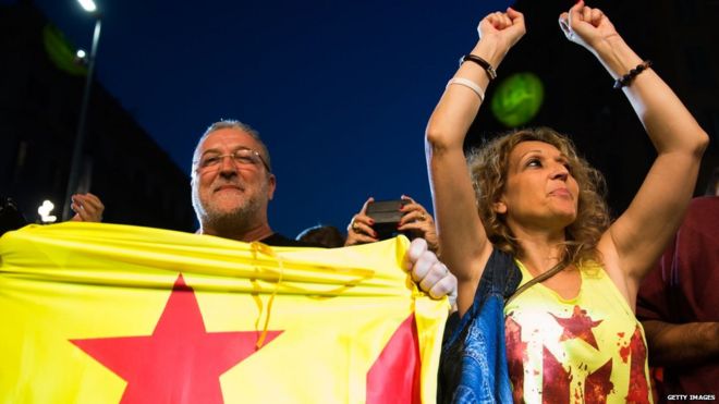 People react to the results of exit polls on September 27, 2015 in Barcelona
