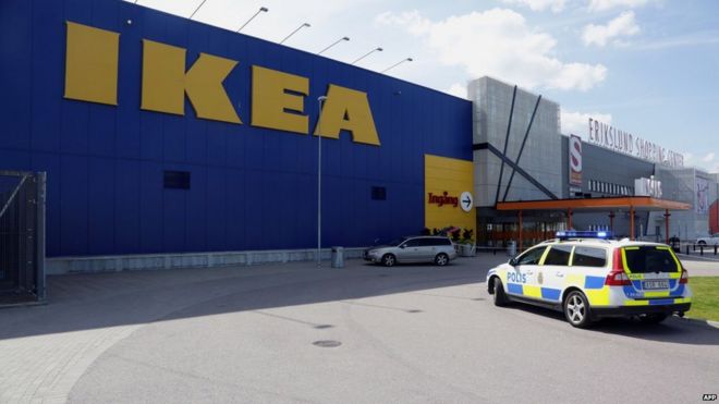 A police car in front of an Ikea store in the central Swedish town of Vasteras on 10 August 2015