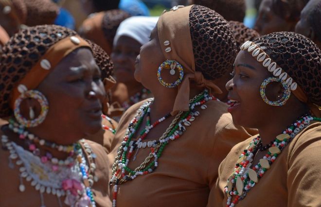 Kenyan women in traditional regalia on Women's Day
