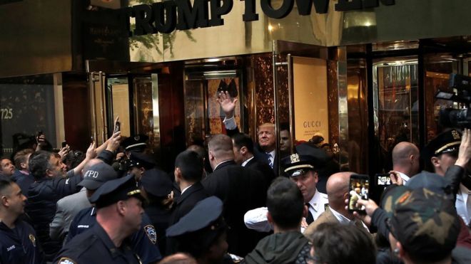 Donald Trump appears outside Trump Tower on 8 October 2016