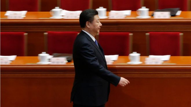China's President Xi Jinping arrives for the second plenary session of the National People's Congress