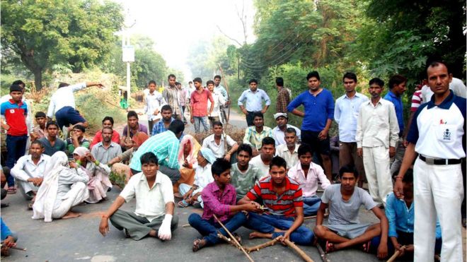 Enraged against the incident at Sunped village, youths blocked road demanding action against the accused, in Faridabad district on Tuesday.