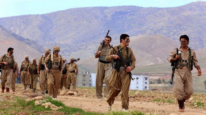 Democratic Party of Iranian Kurdistan (PDKI) Peshmerga take part in military exercises in Koya, northern Iraq, on 9 December 2014