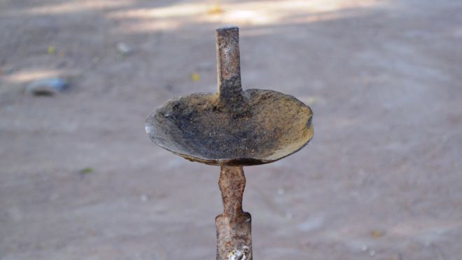 Shea butter lamp used for lighting in rural Mali