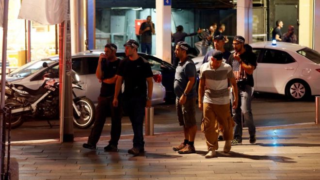 Israeli security personnel at the scene of a shooting in Tel Aviv on 8 June 2016