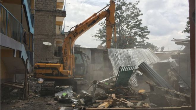 Bulldozer demolishing buildings in Hurama, Nairobi, 6 May 2016
