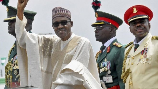 Nigerian President Muhammadu Buhari (2-L) waves to supporters during his inauguration in Abuja, Nigeria 29 May 2015. Muhammadu Buhari was inuagurated as President of Nigeria at a ceremony in the capital Abuja