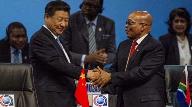 Chinese President Xi Jinping shakes hands with South African President Jacob Zuma. 4 Dec 2015