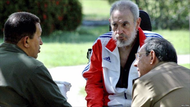 Former Cuban leader Fidel Castro listens during a meeting with his brother Cuban President Raul Castro and Venezuela's President Hugo Chavez in Havana, 18 June 2008.