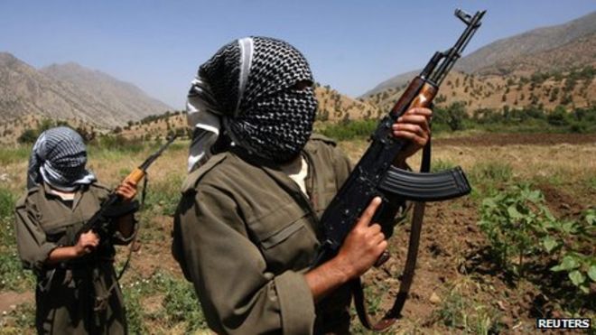 A picture taken in June 2007 of PKK fighters patrolling an area in the Iraqi part of the Qandil mountains near their headquarters on the Iraqi-Iranian-Turkish borders
