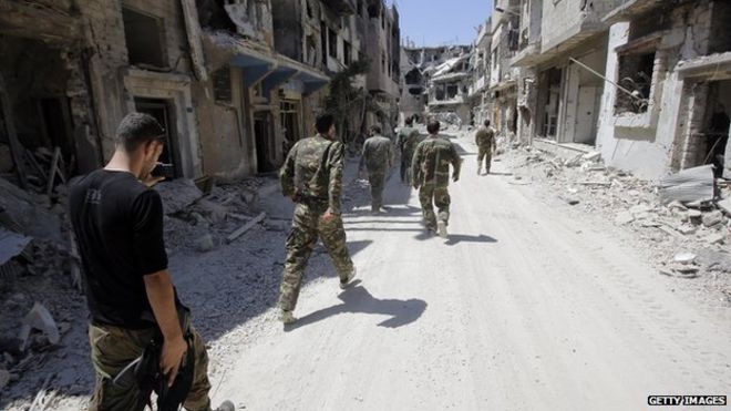 Syrian government forces in Homs in July 2013