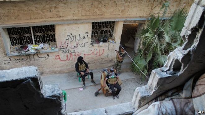 Opposition fighters in the city of Deir Ezzor