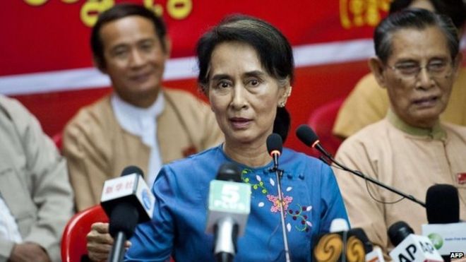 Aung San Suu Kyi talks at an NLD meeting in Rangoon (