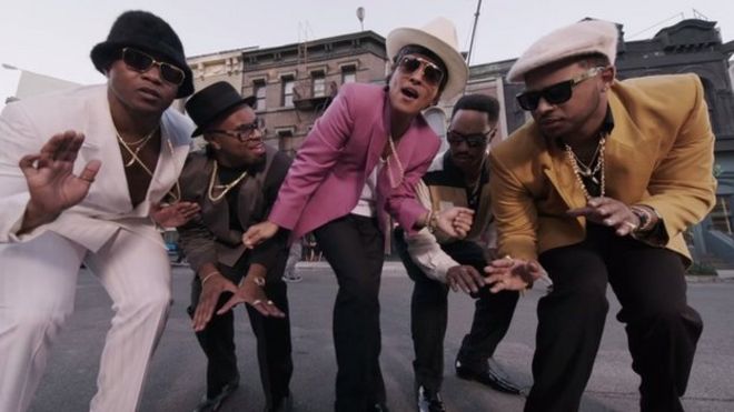 Bruno Mars (centre) in the video for Uptown Funk