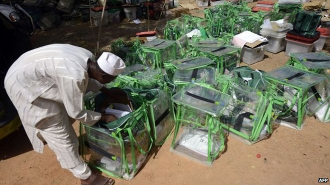 An official of the Independent National Electoral Commission retrieves on March 29, 2015 documents from ballot boxes from the presidential election