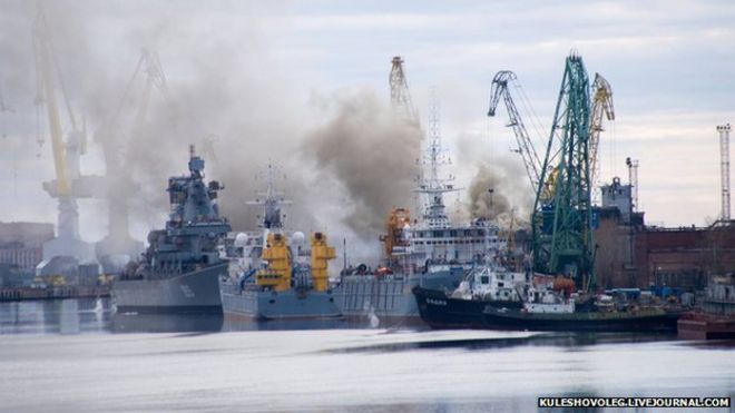 Smoke is seen rising from the Russian nuclear submarine Orel on 7 April 2015