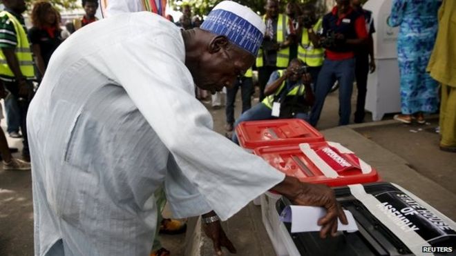 A man casts his vote during the governorship election in Apapa district in Lagos, 11 April 2015