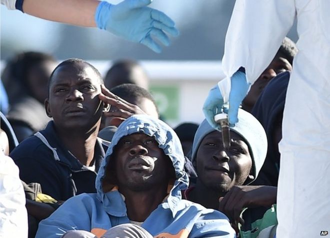 Migrants waiting to disembark in near Siracusa, Sicily, 16 Apr 15