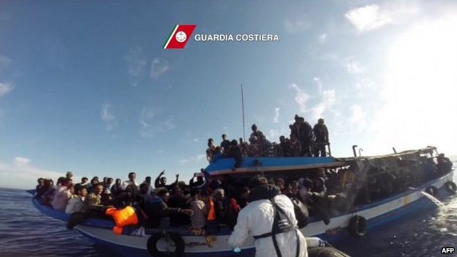 File photo: A boat of the Italian Guardia Costiera takes part in a rescue operation of migrants off the coast of Sicily, 12 April 2015