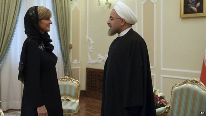 In this photo released by the official website of the office of the Iranian Presidency, Iran's President Hassan Rouhani greets Australian Foreign Minister Julie Bishop at the start of their meeting in Tehran, Iran on 18, April 2015.