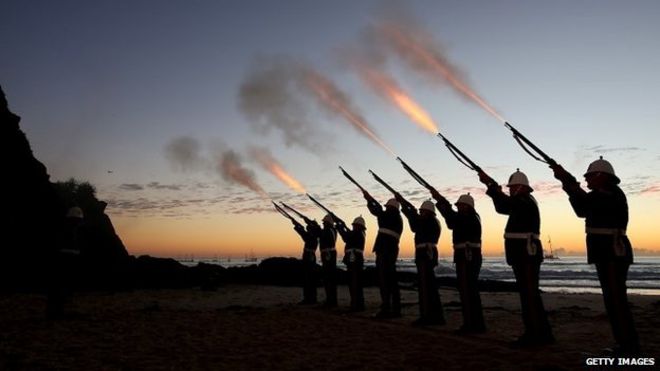 Members of the Albert Battery shoot a volley of fire during a dawn service on 25 April 25 in honour of those who fell at Gallipoli