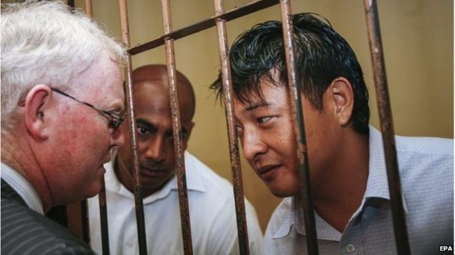 Myuran Sukumaran (centre) and Andrew Chan (right) in jail in Indonesia