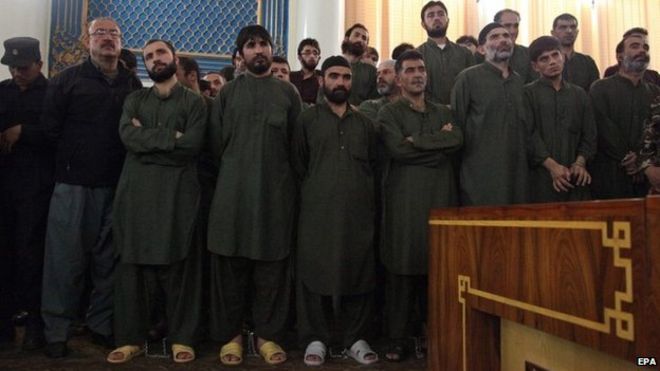 Unidentified suspects attend their primary court trial in Kabul, Afghanistan
