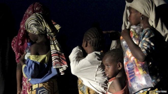 Women and children rescued from Boko Haram arrive at a refugee camp in Yola, north-eastern Nigeria