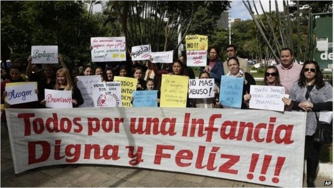 People protest against child abuse, demanding stronger penalties for violators, in downtown Asuncion Paraguay (11 May 2015)