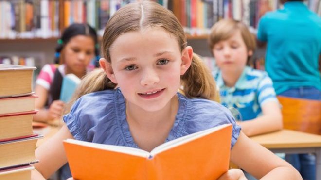 Child with book