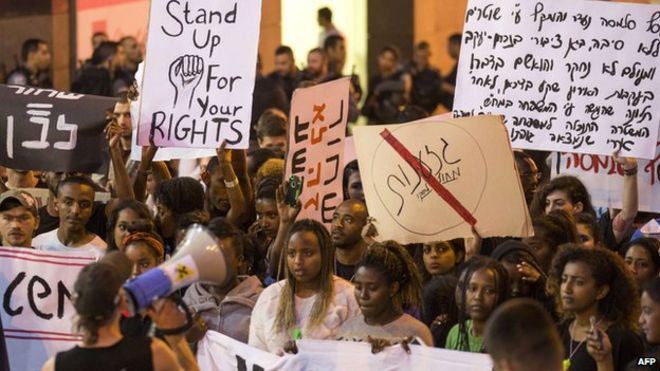 Israelis from the Ethiopian community take part in a protest against alleged police brutality and institutionalised discrimination in Haifa in May 2015