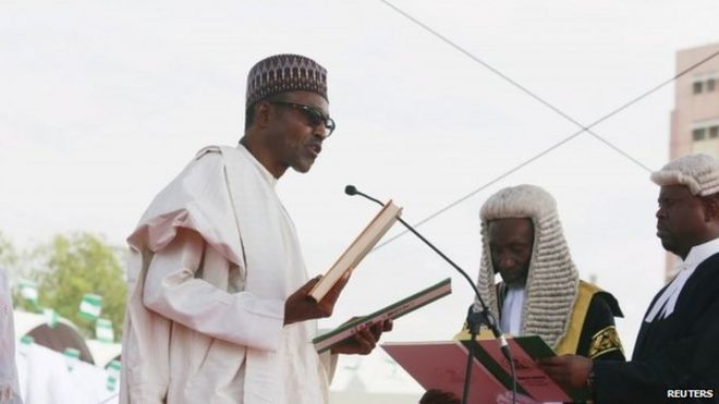 Chief Justice of Nigeria Mahmud Mohammed swears in Muhammadu Buhari as Nigeria"s president at the Eagle Square in Abuja