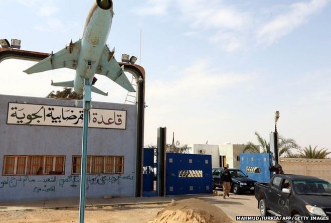 Members of forces loyal to Libya's Islamist-backed parliament General National Congress (GNC) secure al-Ghardabiya airbase as they fight Islamic State (IS) group jihadists on the outskirts of Libya's western city of Sirte on March 16, 2015