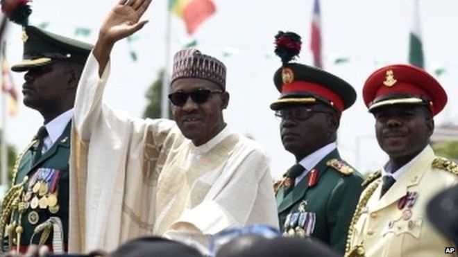 Nigerian President Muhammadu Buhari waves to the crowd in Eagle Square in Abuja, Nigeria - Friday 29 May 2015